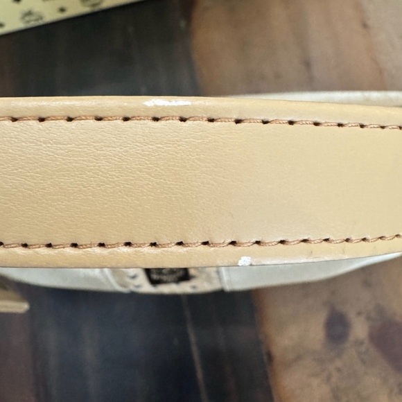 MCM Mini Top Handle Bag
Champagne Monogram Leather - Picture 10 of 15